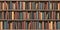 Vintage books on old wooden shelf. Old library or antique bookshop. Tiled seamless texture, wallpaper or background