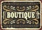 Vintage boutique sign with decorative elements