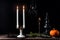 Vintage brass candelabra of five burning candles with dripping wax on a black background vertical background. photo