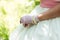 Vintage bride with pearl bracelet on her hand and gloves