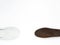 Vintage brown moulds wooden shoe model on white background