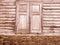 Vintage brown unique ancient wooden window and old crack brick wall retro style in rural for background