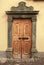 Vintage brown wood medieval door, Italy