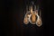 Vintage bulbs on black background - idea, innovation, teamwork and leadership concept. Space for text