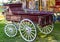 Vintage Burgundy Horse Drawn Wagon On Display