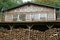 Vintage cabin w/firewood stack