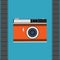 Vintage camera isolated on a blue background. An old camera with black film around the edges. Vintage camera poster