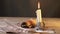 Vintage candle with parchment paper and writing quill