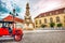 Vintage car on the background Holy Trinity Column or plague column in Fishermans Bastion