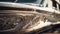 Vintage car chrome bumper reflects elegance and wealth driving outdoors generated by AI