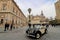 Vintage car in front of the cathedral in Seville