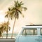 Vintage car parked on the tropical beach