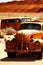 Vintage car with a rusty texture in the desert generated by ai