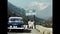 vintage car with sign and view of mount white 60s