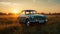 Vintage car speeds through rural landscape, chasing sunset golden beauty generated by AI