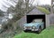 Vintage car triumph tr4 found in derelict abandoned shed garage