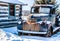 Vintage cars and trucks sit idle in a field. Millarville Alberta Canada