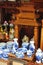 Vintage carved wooden ancestor altar with ceramics at a market in Hanoi, Vietnam