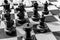 Vintage chessboard close up. Black and white photo