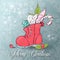 Vintage christmas decoration red stars, sweets and antique baby shoes over snow background. retro style picture