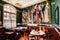 Vintage classic colonial restaurant dining room with wall painting