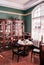 Vintage classic colonial restaurant dining room with wooden wine cabinet