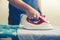 Vintage close up of male hand and iron ironing