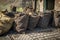 Vintage coal sacks in victorian yard Black Country Museum Stafford England UK