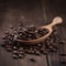 Vintage coffee beans spilling on wooden table.