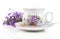 Vintage coffee or tea cups, with blue flowers