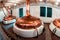 Vintage copper fermentation tanks. Brewery interior