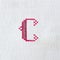 Vintage cross-stitch letter C on linen fabric