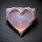 Vintage Crystal Heart with Intricate Carvings on Dark Grey Background