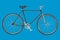 Vintage custom singlespeed bicycle isolated on blue background