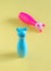 Vintage cute cats toy pink and blue on yellow background.