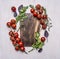 Vintage cutting board with herbs and vegetables on wooden rustic background top view close up place text,frame