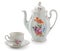 Vintage czech porcelain set for coffee, old style rich decorated by flower decors. There are coffee pot, mugs on a saucer,