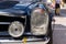 Vintage dark blue Mercedes-Benz 230 SL oldsmobile veteran car standing on street