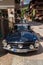 Vintage dark blue Mercedes-Benz 230 SL oldsmobile veteran car standing on street