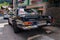 Vintage dark blue Mercedes-Benz 230 SL oldsmobile veteran car standing on street