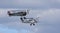 Vintage De Havilland  1928  DH60X  Moth biplane and  Avro 621 Tutor biplane Aircraft in flight cloudy sky.