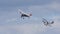 Vintage De Havilland 1928 DH60X Moth biplane and Avro 621 Tutor biplane Aircraft in flight cloudy sky.