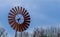 Vintage decorations, a classic old rusty windmill with a blue sky