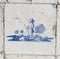 Vintage Delft blue tile with fisherman