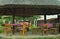 Vintage designed wooden table and chairs under cane shed