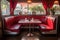 vintage diner booth with red leather seats