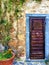 Vintage door, plant and fairytale in Civita di Bagnoregio, town in the province of Viterbo, Italy