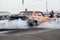 Vintage drag car in action at the starting line