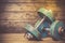 Vintage dumbbells on the wooden floor.