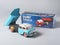 Vintage dump truck tin toy with its packaging box